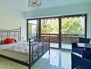 bedroom with balcony