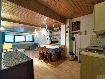 living room with kitchen corner
