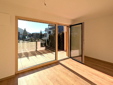 Wohnküche mit Zugang zum Garten